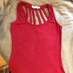 Red tank top with cage detailing on neckline